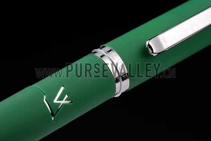 Louis Vuitton Rounded Green Ballpoint Pen With Pointed Silver Ends And Louis Vuitton Engraved Cap