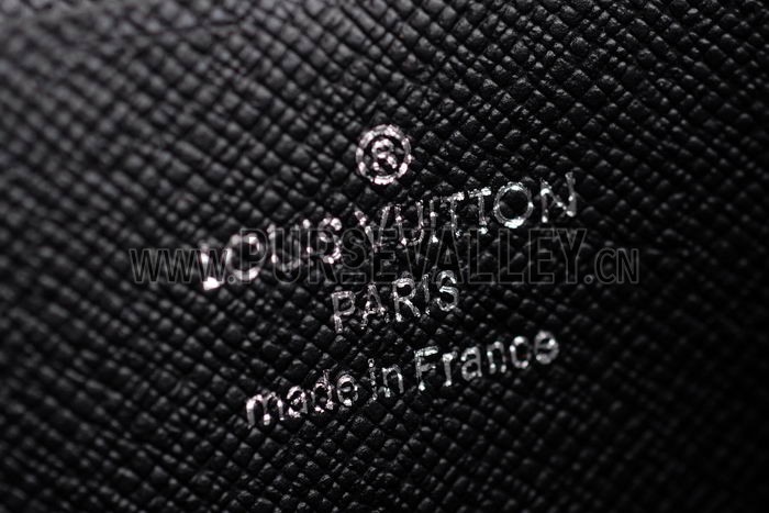 Louis Vuitton Zipped Black Taiga Wallet