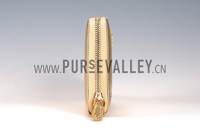 Prada Vernice Saffiano Leather Zip Around Gold Wallet