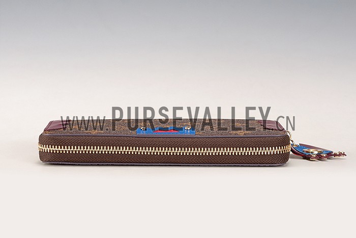 Louis Vuitton Monogram Totem Zippy Wallet Plum