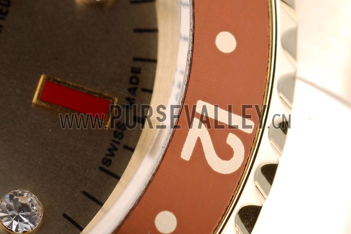 Rolex GMT Master II Gold Colored Ceramic Bezel Gold Dial Tachymeter