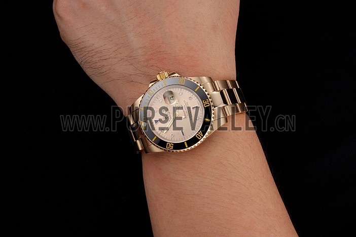 Swiss Rolex Submariner Gold Dial With Diamond Markings Black Bezel Yellow Gold Case And Bracelet